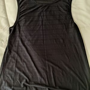 EUC black luxe muscle tank, ZYIA size large